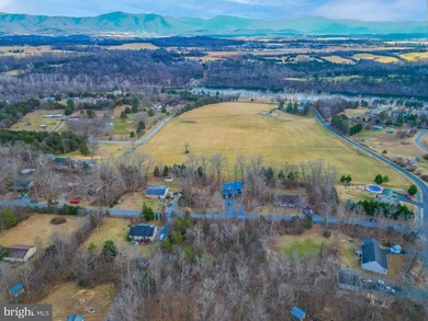 Discover the possibilities on Riverbend Drive. Tucked within a - photo 4