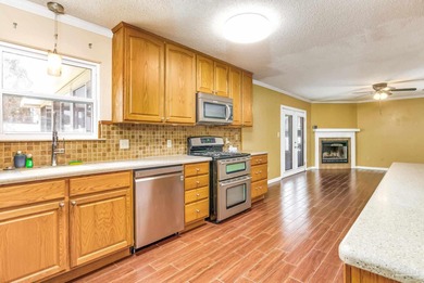 Welcome to this beautifully updated home in the desirable Quail