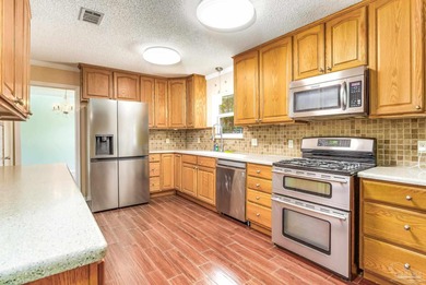 Welcome to this beautifully updated home in the desirable Quail