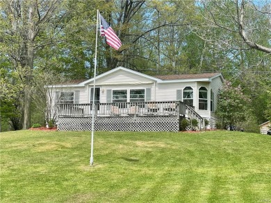Summer is calling!! This 3BD/2BA home located on the channel - Lake Home For Sale in Sandy Creek, New York