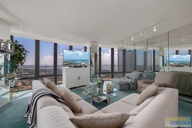 Experience elevated penthouse living in this exquisitely - photo 1