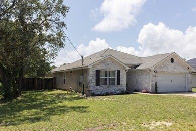Welcome home to this charming Craftsman-style residence located - photo 3