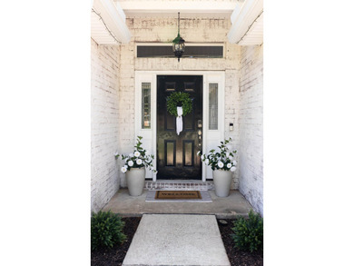 Welcome home to this charming Craftsman-style residence located - photo 4