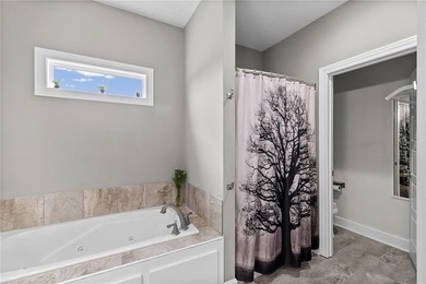 Perched atop 8+ acres, this beautiful reverse 1.5-story home - photo 14