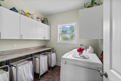 Perched atop 8+ acres, this beautiful reverse 1.5-story home - photo 16