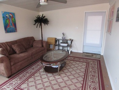 Furnished two bed two bath with rear deck on the pond . Extra - photo 17
