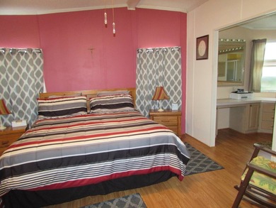Furnished two bed two bath with rear deck on the pond . Extra - photo 26