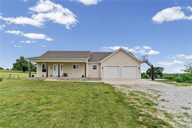 Perched atop 8+ acres, this beautiful reverse 1.5-story home - photo 32