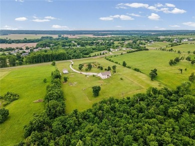 Perched atop 8+ acres, this beautiful reverse 1.5-story home - photo 40