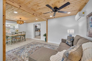 Grab your flip flops, beach cruiser, and paddleboard-your New - photo 6