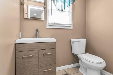 Spacious and sun filled this mid-block ranch has it all - photo 25