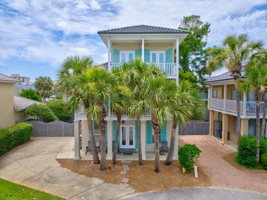 Discover coastal living just steps from the sugar-white sands of - photo 1