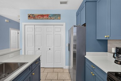 Discover coastal living just steps from the sugar-white sands of - photo 7