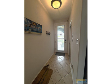 Great channel front home & neighborhood location with boat lift - photo 7