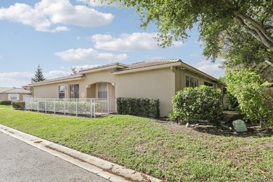 This spacious end-unit home is vacant and move-in ready! Tucked - photo 2