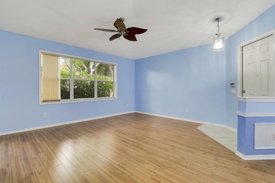 This spacious end-unit home is vacant and move-in ready! Tucked - photo 8