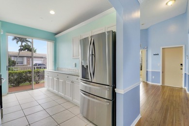 This spacious end-unit home is vacant and move-in ready! Tucked - photo 10
