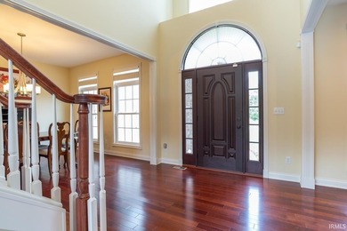 This beautiful Amber Ridge custom brick home on Bloomington's - photo 3