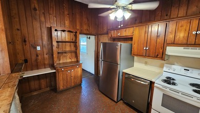 Embrace the coastal lifestyle with this charming fixer-upper - photo 4