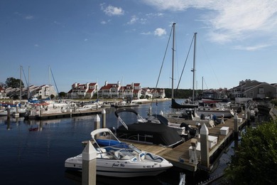 Deeded 30' boat slip in the charming Nantucket style community - photo 13