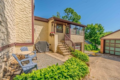 Picture-perfect 3-bedroom, 1.5-bath Tudor set on a tree-lined - photo 3
