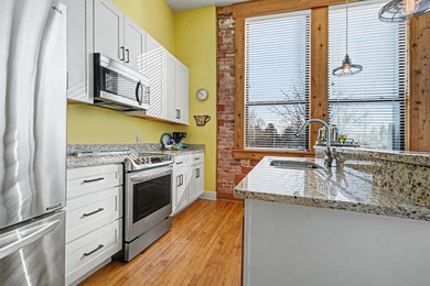 Loft Style Condo in the highly sought-after Central Lofts! This