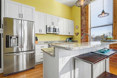 Loft Style Condo in the highly sought-after Central Lofts! This