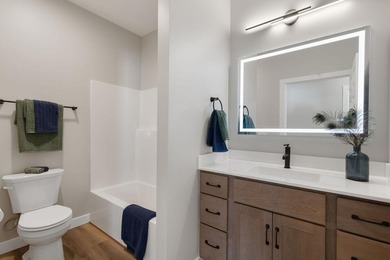 This zero-entry townhome features high-end finishes, including