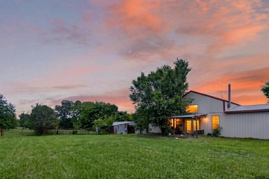 Set on 5.496 scenic acres in Alba, this versatile property is - photo 1