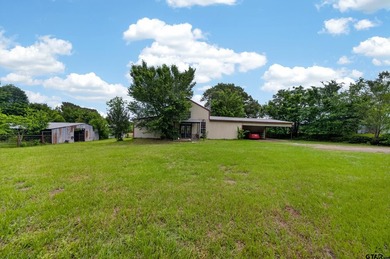 Set on 5.496 scenic acres in Alba, this versatile property is - photo 2