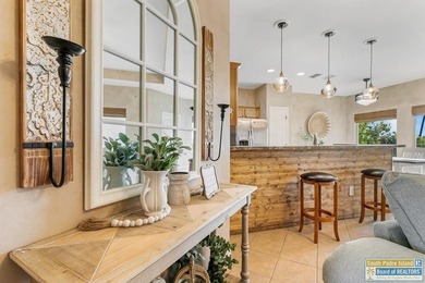 Welcome to coastal living at its best! This charming 3-bedroom - photo 2