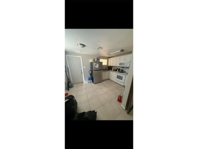 Well maintained Sarasota 3BR/1BA block home featuring a brand - photo 4