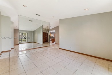 This beautifully maintained 4-bedroom, 2-bath home presents a - photo 12