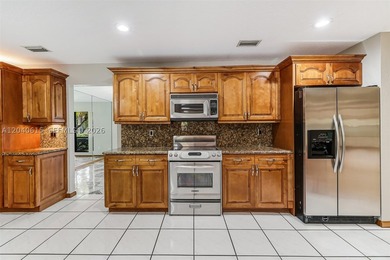 This beautifully maintained 4-bedroom, 2-bath home presents a - photo 22
