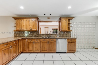 This beautifully maintained 4-bedroom, 2-bath home presents a - photo 23