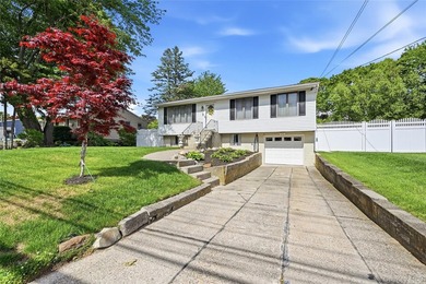 This pristine raised ranch may be just what you're loooking for! - photo 1