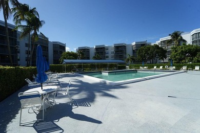 Rarely available corner unit w/ one of the best pool views in - photo 16