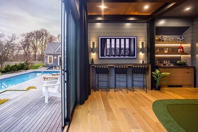 Set on three private acres abutting Newport National Golf Club - photo 37