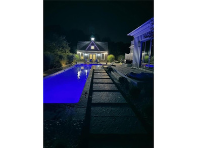 Set on three private acres abutting Newport National Golf Club - photo 40
