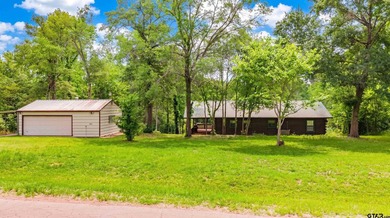 Adorable log cabin on beautiful Lake Winnsboro nestled in a - photo 9