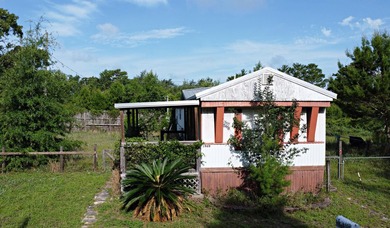 Investor, cash buyer, or renovation opportunity in Navarre! - photo 2