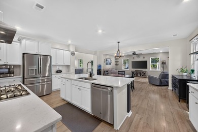 Vacation living, every day. Set on a nearly half-acre corner lot - photo 11