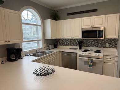 Welcome home to this golf course view condo located in the - photo 6