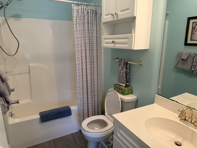 Welcome home to this golf course view condo located in the - photo 10