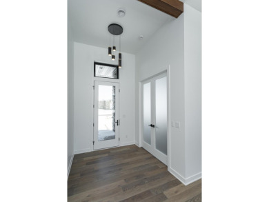 Situated on a 0.27-acre lot in the desirable Century Valley