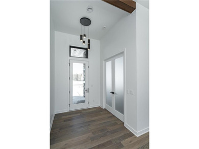 Situated on a 0.27-acre lot in the desirable Century Valley