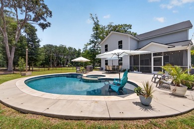 Vacation living, every day. Set on a nearly half-acre corner lot - photo 49