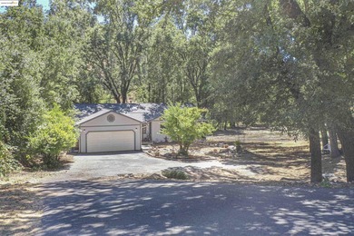 Tucked away on a peaceful cul-de-sac in the beautiful gated