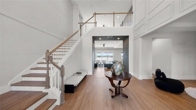This never-lived-in luxury residence presents an extraordinary - photo 4