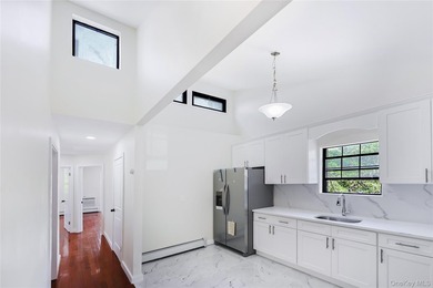Welcome to this fully renovated 2-Family Condo Townhouse located - photo 2